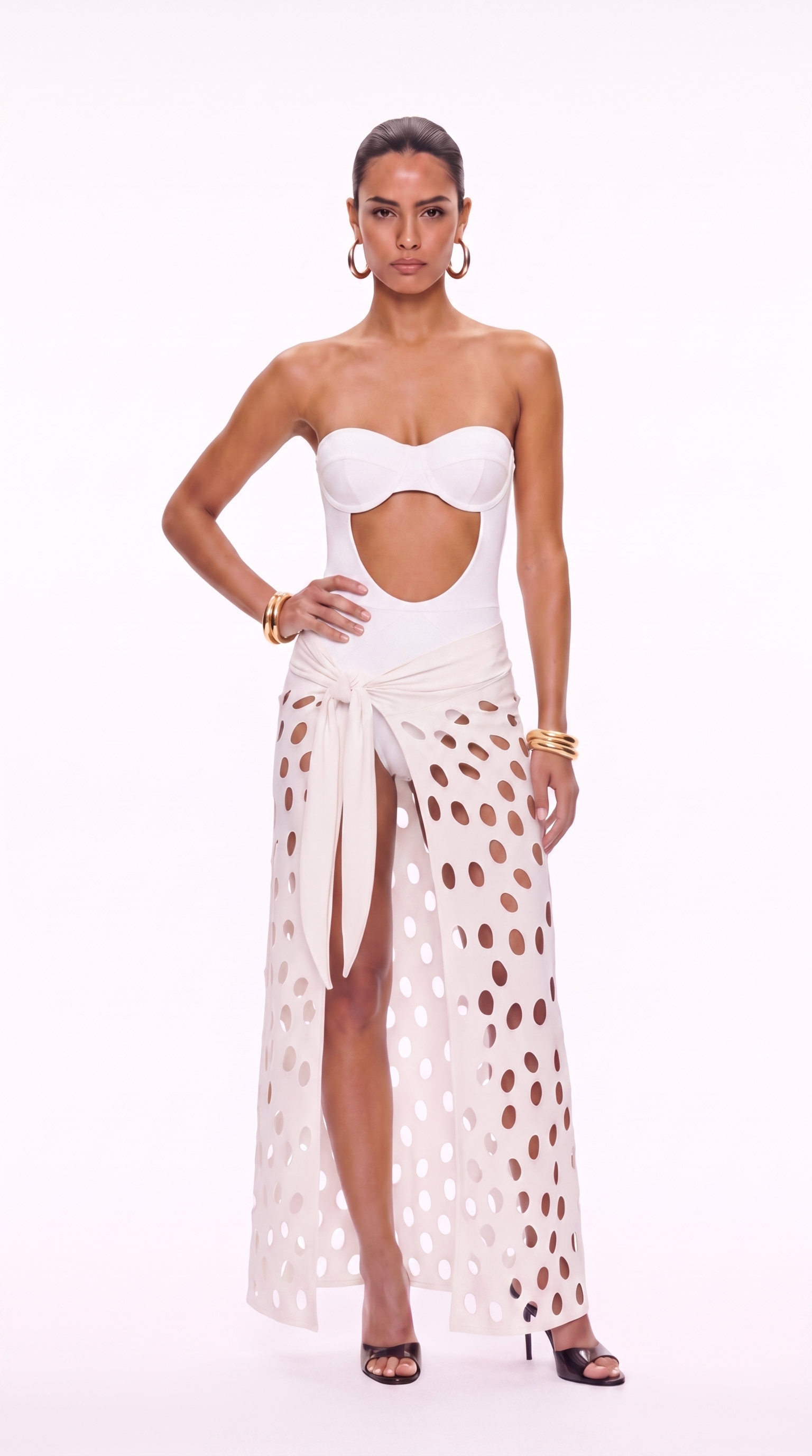 Front view of cream Del Mar collection cutwork skirt with oval perforations and side knot
